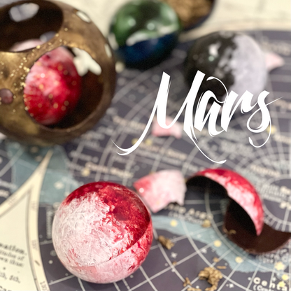Handcrafted mars-shape chocolate ball with chocolate crunch
